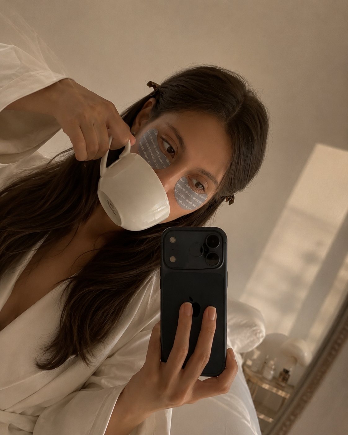 Wearing Yumeskin eye patches with morning coffee